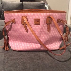 Women’s pink and tan Dooney and Bourke Purse